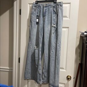 Fashion Nova Light Blue Distressed Flare Jeans